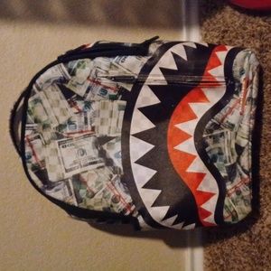 Used Sprayground backpack shark money